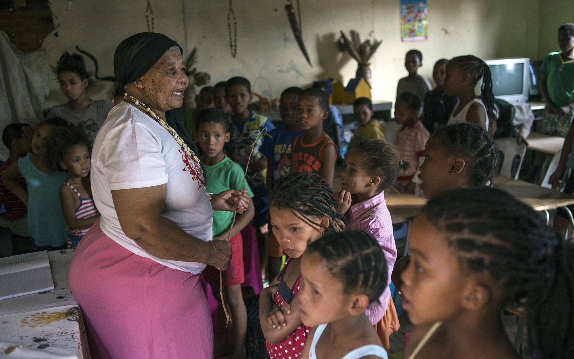Village elder from the Pacific imparting traditional knowledge