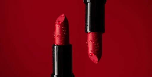 closeup-on-two-red-lipsticks-260nw-2216522133