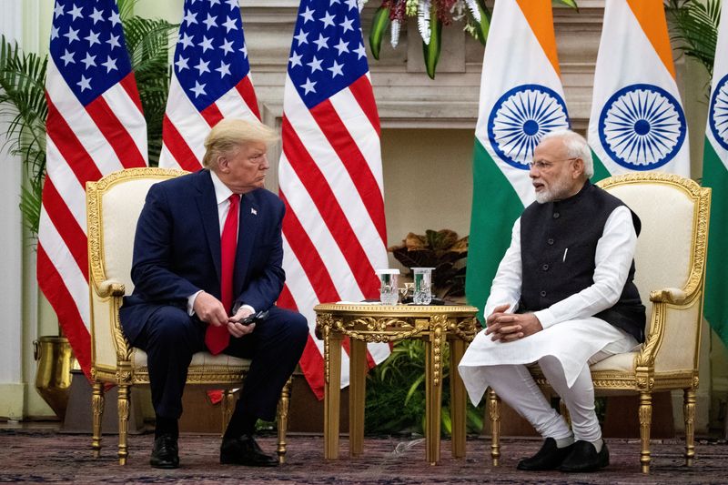 FILE PHOTO: Indian Prime Minister Narendra Modi speaks to U.S. President Donald Trump