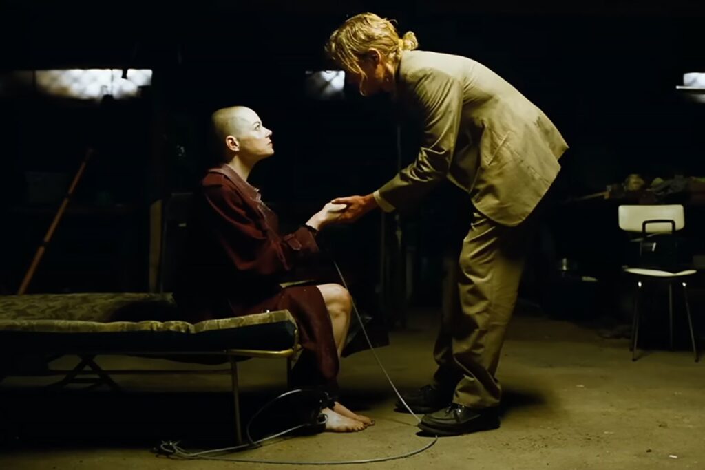 A striking visual of people as symbolic structures surrounded with postmodern negative space 