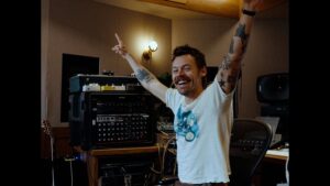 Harry Styles returns in 2026 with a new album and record-breaking world tour.