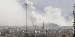 Smoke rising above Tehran