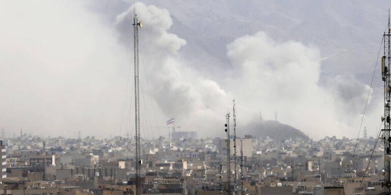 Smoke rising above Tehran