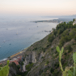 set-jetting travel guide 2026, Taormina Sicily White Lotus filming location aerial view