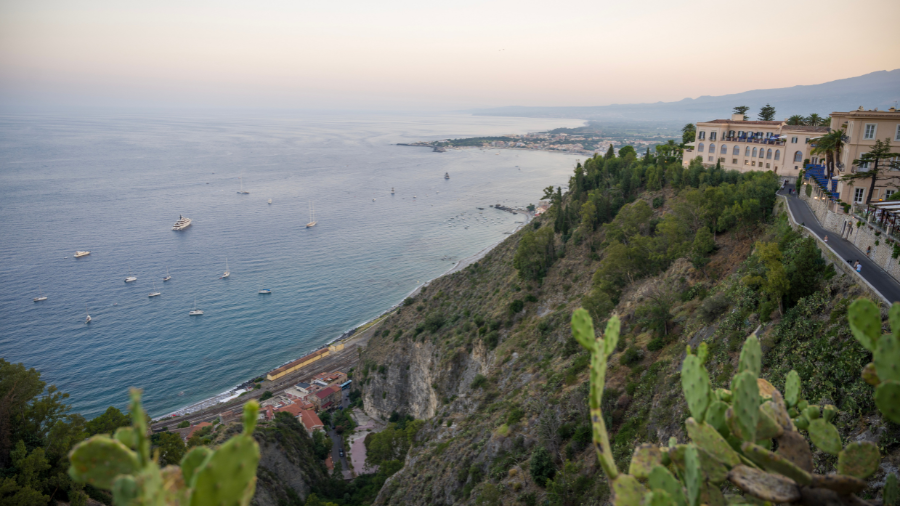 set-jetting travel guide 2026, Taormina Sicily White Lotus filming location aerial view