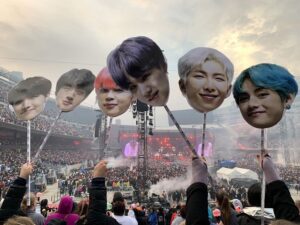K-Pop idols and their beloved fandom.