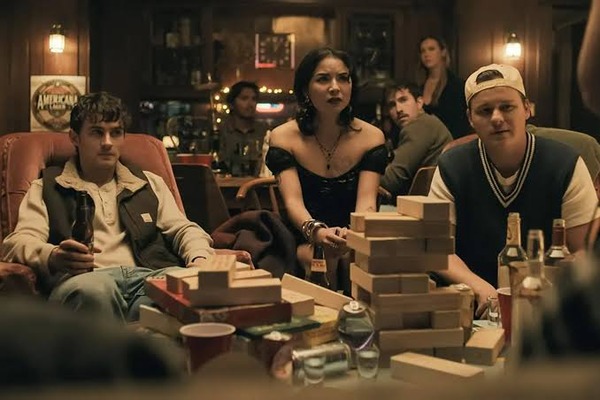 A group scene from Obsession.