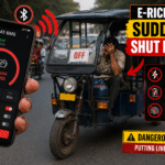 A smartphone displaying the BAT-BMS app interface being used to remotely disable an e-rickshaw, illustrating the dangerous e-rickshaw Bluetooth hack and security vulnerability.