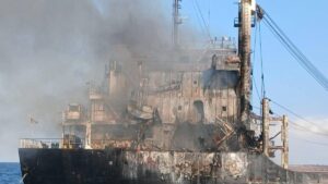 Photograph released by the Ukrainian Navy showing the damaged vessel, following the alleged Russian strike that killed four Indian sailors.