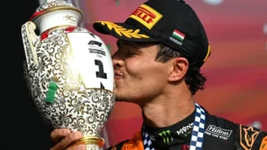 Lando Norris celebrates after winning the Hungarian Grand Prix for McLaren, securing his first Grand Prix victory of the year.