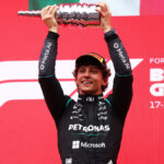 Kimi Antonelli celebrates after winning the 2026 Belgian Grand Prix at the Spa-Francorchamps circuit.