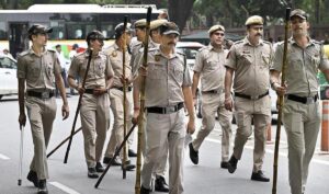 Delhi police personnel deployed during law enforcement operations related to Delhi High Court proceedings. 