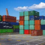 Cargo containers linked to Vietnam-US trade cooperation and transshipment.