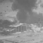Smoke rises after US strikes on Iranian military targets amid escalating Red Sea attacks.