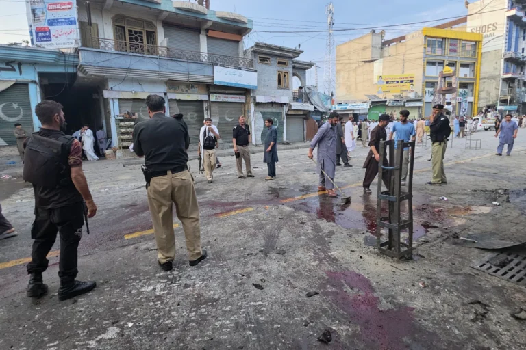 Swat Valley suicide bombing scene following an anti-militant rally in Pakistan.